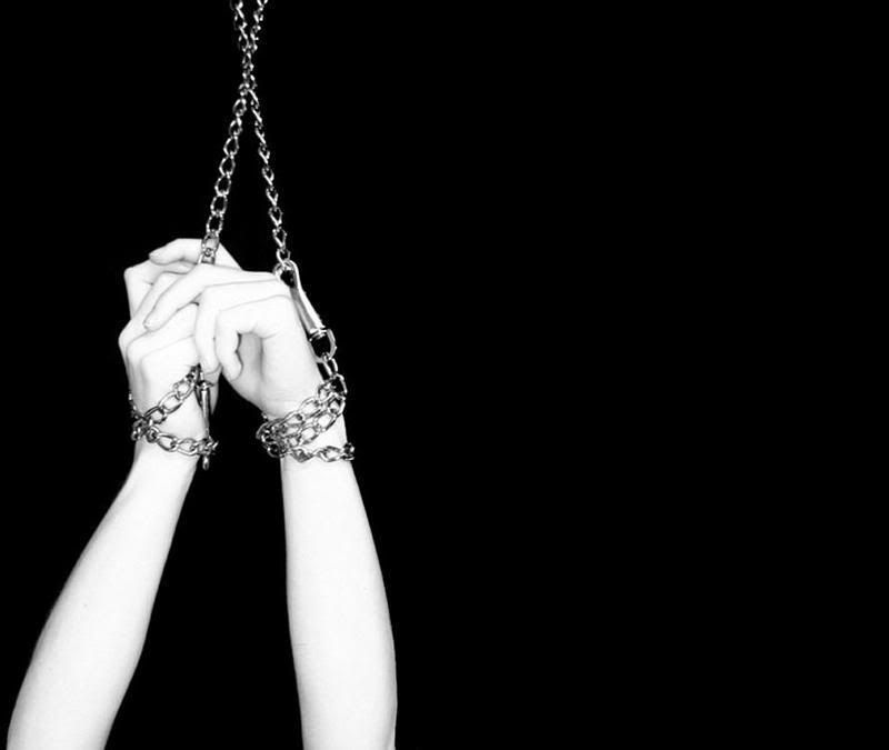 Hands tied up above head photo: tied up hands chains-hands.jpg