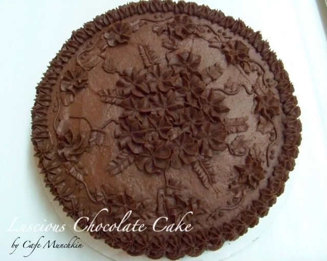chocolate cake pictures. Spread frosting on the cake;